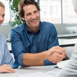 woman and man make a good deal with The Wholesale Flooring Company in Myrtle Beach, SC