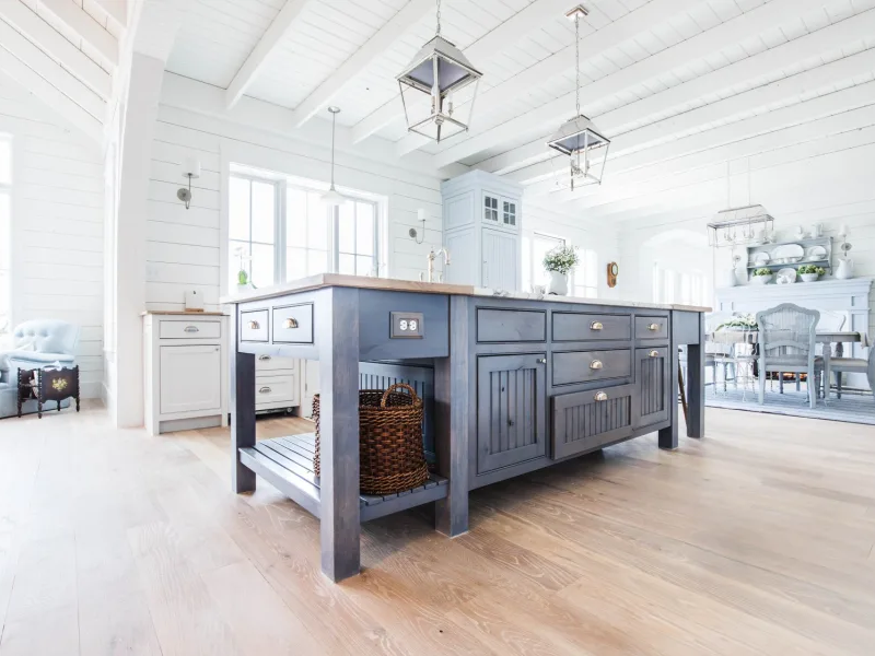 gray island kitchen and brown hardwood floor from The Wholesale Flooring Company in Myrtle Beach, SC