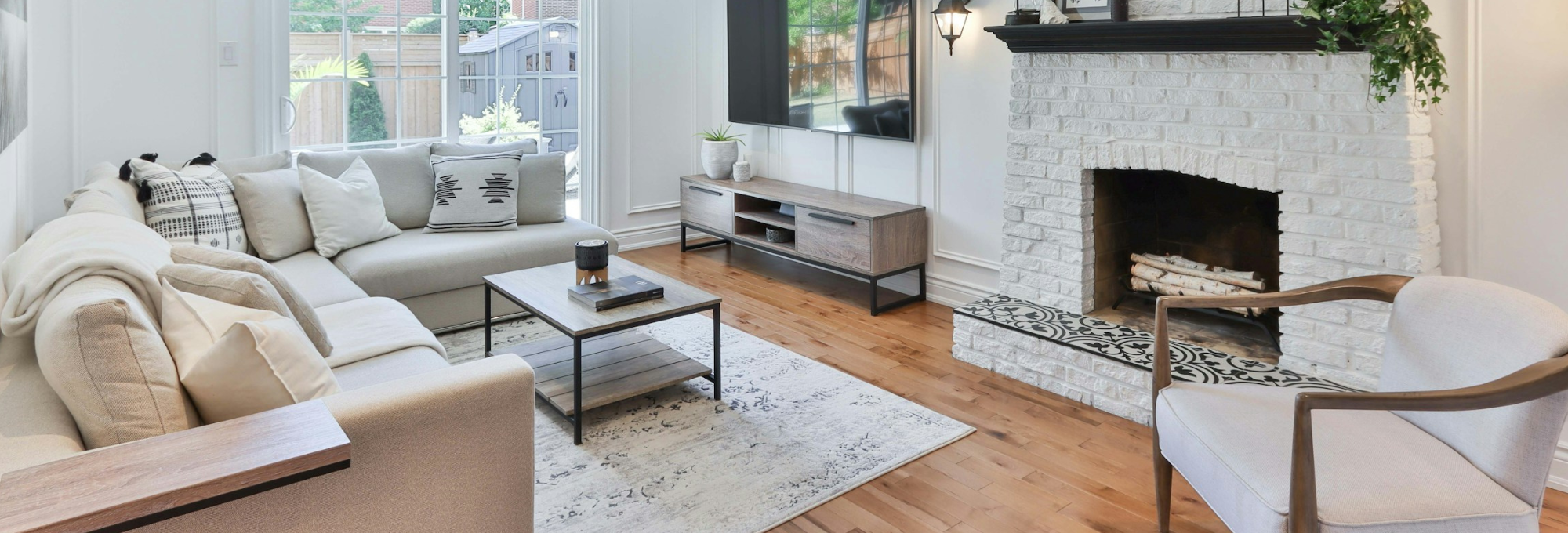 Cozy home with wood flooring and a fireplace