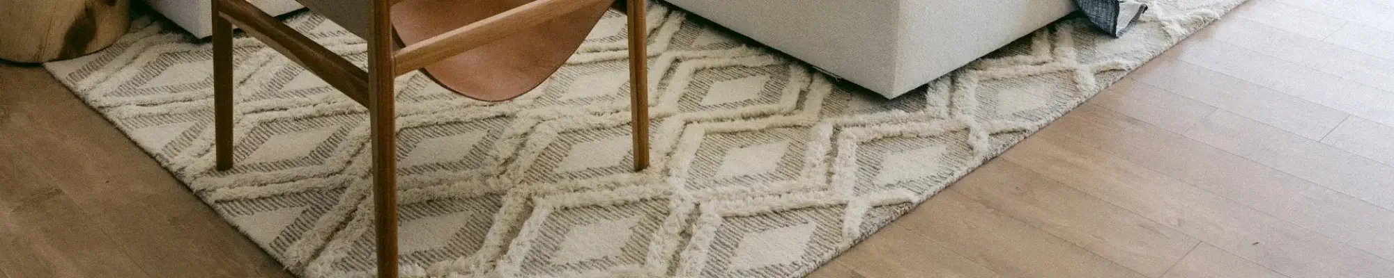 Textured area rug on a hardwood floor