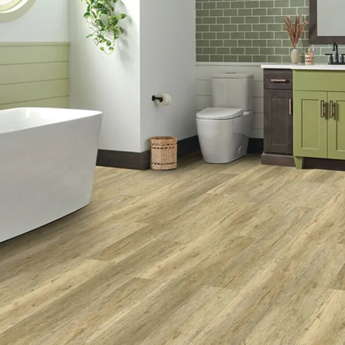 Bathroom with waterproof floors by The Wholesale Flooring Co